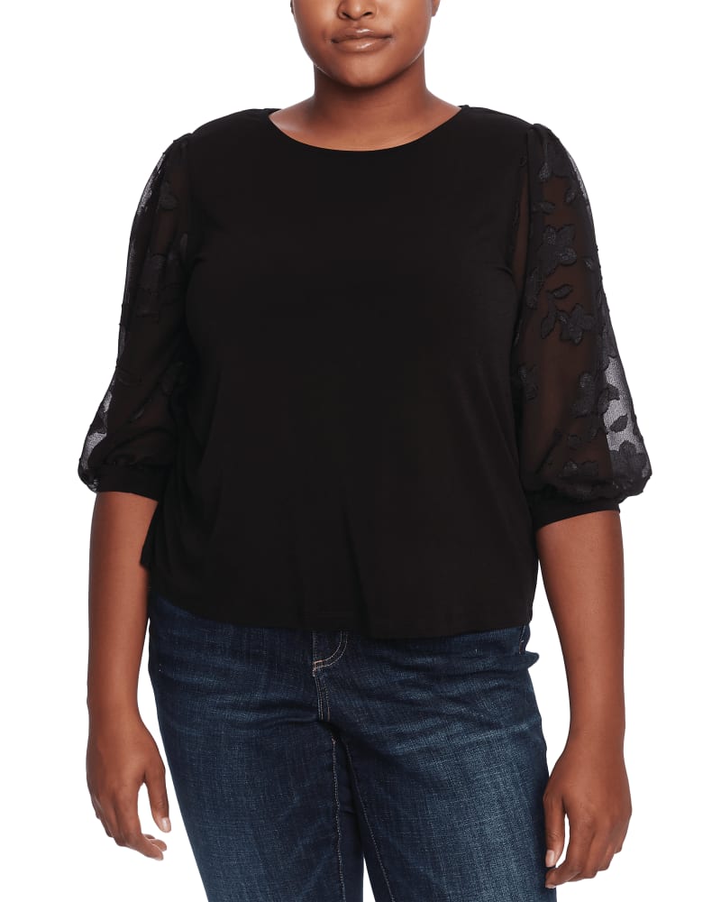 Front of a model wearing a size 1X Rosalie Puff-Sleeve Top in 060-RICH BLACK by CeCe. | dia_product_style_image_id:263478